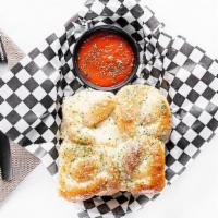 Garlic Knots · Vegetarian delights. Freshly baked and brushed with garlic, sesame seeds, and Romano cheese....