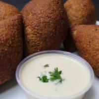 Fried Kibbeh (3) Pieces · A shell of bulgur wheat and minced beef stuffed with ground. beef, garlic, pine nuts and spi...