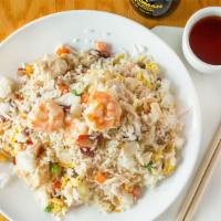 Young Chow Fried Rice · Perdue Chicken, Roast Pork  and Atlantic Shrimp. Woked with onions, carrots, peas and bean s...