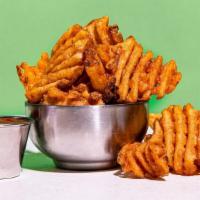 Waffle Fries · crispy waffle fries served with a side of truffle ketchup