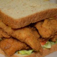 Fish Supreme Sandwich · Lettuce,tomato,cheese,tartar sauce,must,ket.