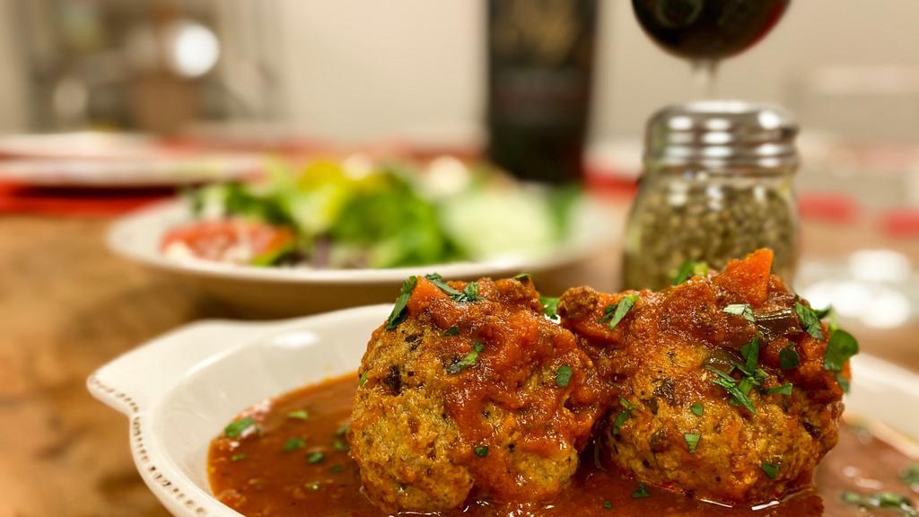 Russo'S Homemade Meatballs · Russo's Coal Fired Italian Kitchen favorite: Two large homemade italian meatballs served with russo's bolognese meat sauce.