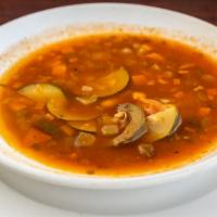 Minestrone Soup · Fresh garden vegetables, cannellini beans and penne pasta, in a savory vegetable broth.
