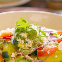Cucumber & Feta Salad · Fresh Italian herbs, sliced cucumber with feta cheese, roma tomatoes, red onions, kalamata o...