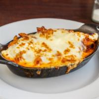 Baked Ziti · Penne pasta, ricotta cheese, Wisconsin mozzarella, basil, pecorino Romano cheese and Russo’s...