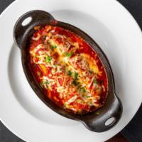 Chicken & Ricotta Cannelloni · Fresh pasta stuffed with chicken, fresh spinach, ricotta cheese topped with Russo's marinara...