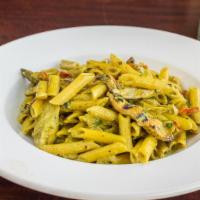 Chicken Al Pesto · Al dente penne pasta with grilled chicken, sun-dried tomatoes and artichoke hearts, tossed
i...