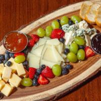 3 Cheese Board · Aged Cheddar, Gorgonzola and Asiago Cheese, Served with Cracked Pepper Apricot Compote and B...