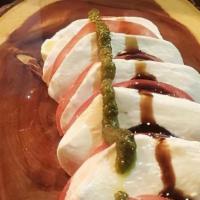 Froina Albarino & Caprese Salad · Floral, crisp and frizzy this albarino complements the lightness and creaminess of this colo...