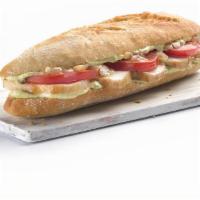 Chicken With Pesto Baguette · Bocadillo pollo pesto. Crunchy bread with sliced chicken breast, fresh tomato and caramelize...