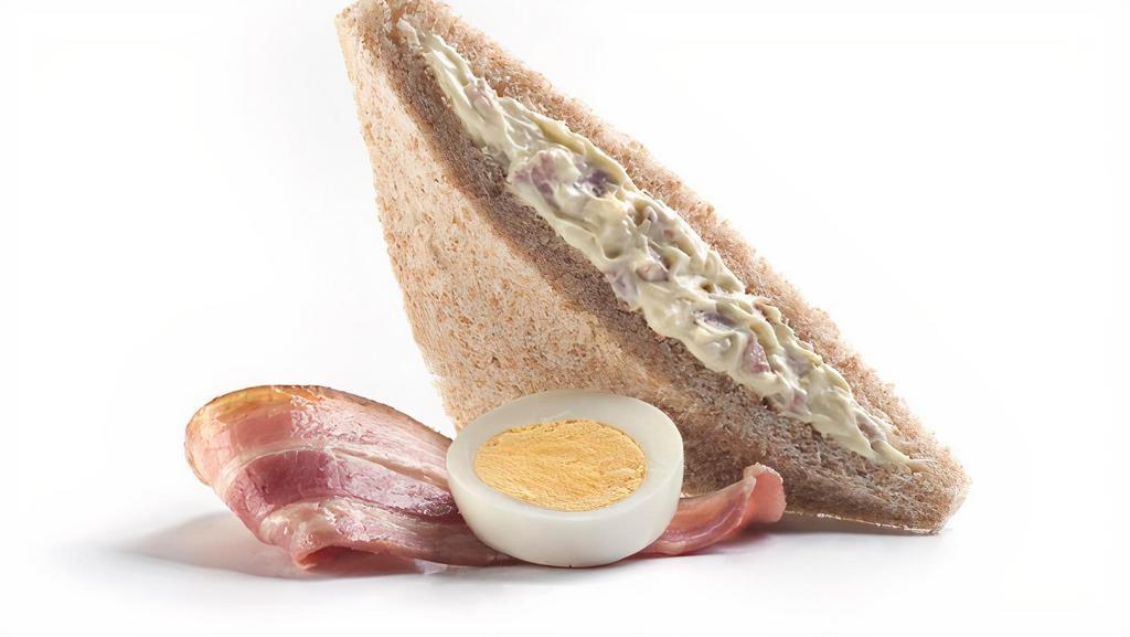 Bacon And Egg Sandwich · Sandwich bacon huevo. The softness of our sandwich bread and the unmistakable flavor of crisp bacon and egg.