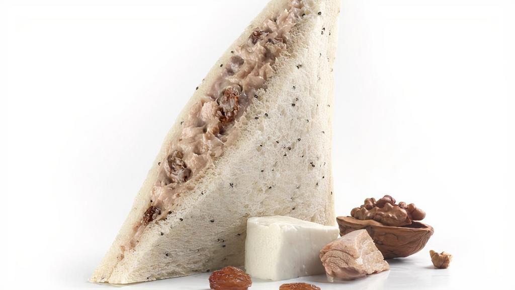 Tuna, Walnuts And Port Sandwich · Sandwich atun nuez oporto. Our special Rodilla poppy seeds artisan sandwich bread with a smooth mix spread made with cheese, tuna, raisins, walnuts and a touch of port wine.