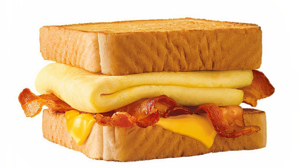 Bacon Breakfast Toaster® · Behold – melty cheese, crispy bacon all stacked up on thick Texas Toast and served with fluffy eggs. Sounds like breakfast heaven if you ask us.
