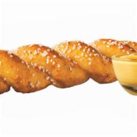 Soft Pretzel Twist · A soft pretzel twisted into a tasty treat and served with One Signature Cheese Sauce!