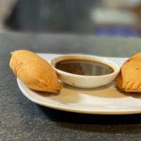 Chicken Cheese Poori · Pastry sheets filled with creamy cheese and shredded chicken. (2pcs)