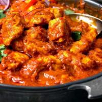 Madras · Cooked in onion based curry sauce and spices in south Indian style.