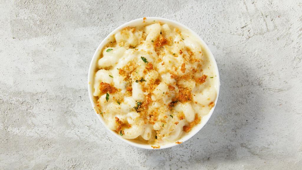 Mac And Cheese · A creamy blend of 5 cheeses: White Cheddar, Asiago, Mozzarella, Neufchatel and Romano. Topped with freshly shredded Mozzarella, seasoned breadcrumbs and fresh Italian parsley.