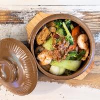 Hot Clay Pot Rice · Stir fried assorted vegetables in a house special sauce over crispy baked rice with your cho...