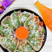 Street Tacos Platter  · Serves 4 ; 12 Tacos + Veggies + Sauces +  Beverage 1.58 Lt . Carnitas- Pork Carnitas ONLY AV...