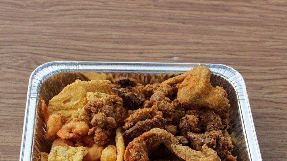 Seafood Platter 2 · PICK FOUR: Wings, Gizzards, Livers, Tender, Shrimp, Fish, Oysters, and Scallops.