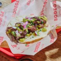 Carne Asada · Grilled Ribeye Steak, Red Onion, Cilantro, Avocado Salsa