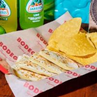 Kids Cheese Quesadilla · Plain Tortilla with Cheese Served with Chips