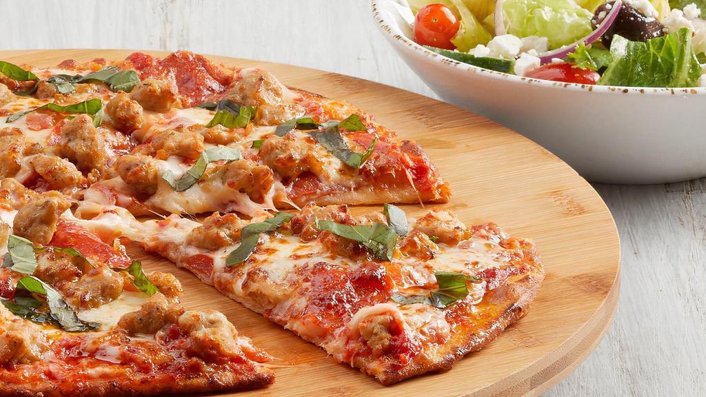 Pizza Pick A Pair · Choose any Entrée Pizza to pair with a Cup of Soup, Bowl of Fruit, Bowl of Pasta Salad, Half Mac & Cheese or Half Classic Salad. *Upcharge for Premium Pizzas. Calories are displayed with pizza by the slice. 6 slices per pizza.