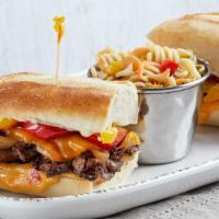 Newk'S Cheesesteak (P) · Medium-rare petite tenderloin steak, caramelized onions, red and yellow bell peppers, chedda...