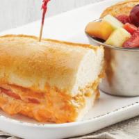 Pimiento Cheese · Scratch-made with aged yellow and Vermont white cheddar with tomatoes on Parisian bread. (N)...