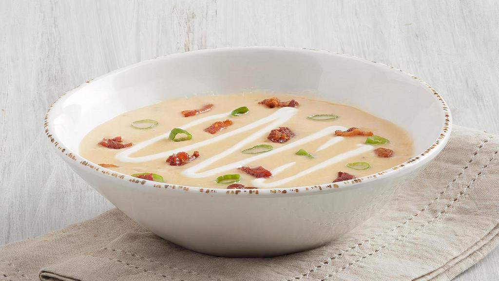 Loaded Potato · A creamy chowder of potatoes, chives, bacon, sour cream, and melted cheese.