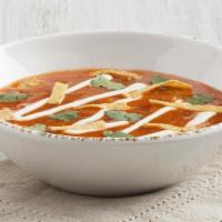 Chicken Tortilla · A rich chicken broth loaded with chicken and vegetables and seasoned with a touch of Ancho c...