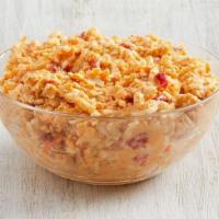 Grab & Go Pimiento Cheese Bulk Container · Creamy pimiento cheese – made from scratch with aged yellow and Vermont white cheddar cheese...
