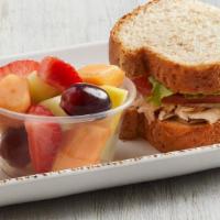 Sandwiches · Premium meats and cheeses served on croissant or honey wheat berry bread.