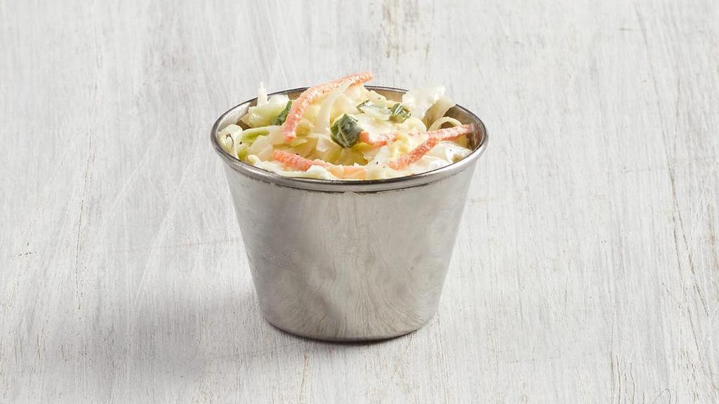 Coleslaw · With shredded cabbage, white vinegar, real mayo, spices, diced green onions and shredded carrots. (V)