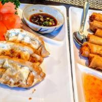 Gyoza · Steamed or Fried, Pork pot-stickers served with vinegar soy sauce.