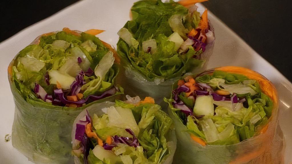 Fresh Roll (Shrimp) · Shrimp, lettuce, fresh basil, carrots, red cabbage, and cucumber wrapped in rice paper and served with peanut sauce.