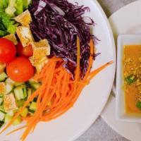 Salad Kae · Mixed vegetable salad with peanut dressing and crispy tofu.