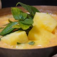 Pineapple Curry · A unique western thai curry with a strong sweet and spicy flavor with green beans and carrot...