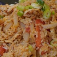 Thai Fried Rice · Flavorful spices, tomatoes, onions and egg.