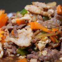 Thai Black Bean Sauce  · Nancy’s Favorite Dish with a Combination of Chicken, Beef and Pork in a Black Bean Sauce, Fr...