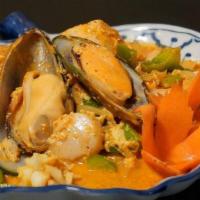 Pad Garee Talay Seafood · Stir-Fried Scallops. Mussels, Shrimp and Calamari with Turmeric Curry, Egg, Garlic, Onion, G...