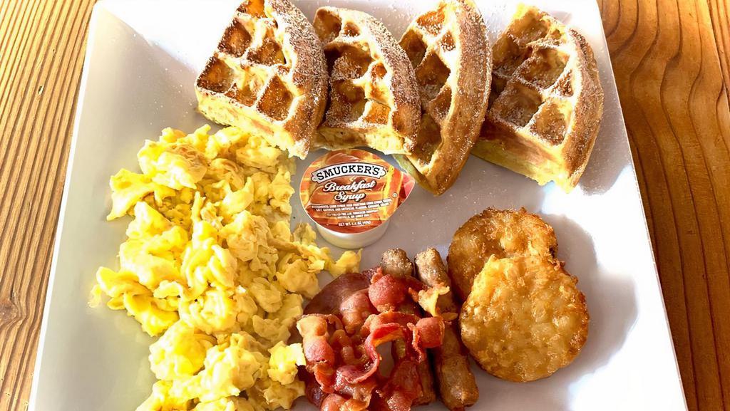 American Breakfast · Homemade waffles, scramble eggs, bacon & hash brown.
