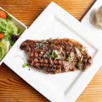 Ny Steak / Bife De Chorizo Grill · 10 ounces new york strip steak, house salad, and choice of one side. (Sold out)

Consuming r...