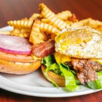 Hangover Burger · Topped with American cheese, bacon, and a fried egg. Served with lettuce, tomato, onions, pi...