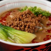Spicy Umami Miso Ramen · Pork broth - ground pork, bean sprouts, green onion, bok choy, chili oil. Served with thick ...