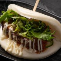 Jinya Bun (1 Pc) · Steamed bun stuffed with slowly braised pork chashu, cucumber, and baby mixed greens served ...