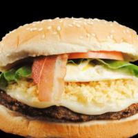 Hamburguesa Criolla / Creole Burger · Media libra de carne, queso, papitas trituradas, huevo frito, tocino, tomate, lechuga, salsa...