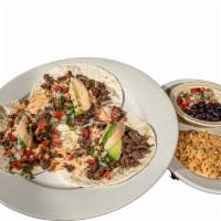 Tacos Chipotle · 3 Tacos. Choice of fish, shrimp, chicken or steak. 
Chipotle sauce, served with rice, black ...