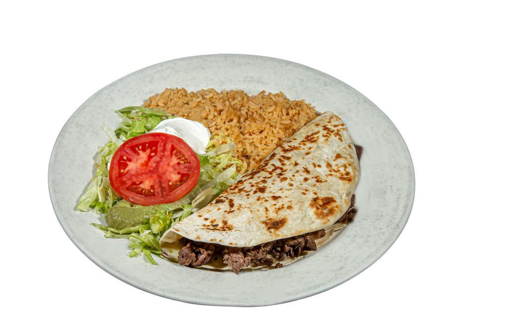 Quesadilla Mexicana · A cheese quesadilla filled with your choice of steak or grilled chicken. Served with lettuce, tomato, guacamole, sour cream and rice.