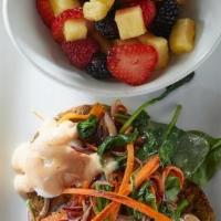 California Veggie Benedict · Grilled vegetarian patties topped with carrot, purple onion and spinach sesame sauté, poache...